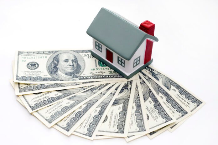 house with dollar bills background house with dollar bills background