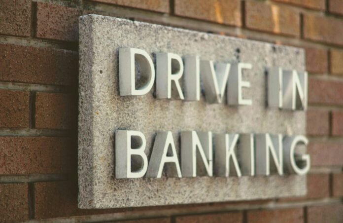 Dodd-Frank Act Wall mounted sign with the words drive in banking